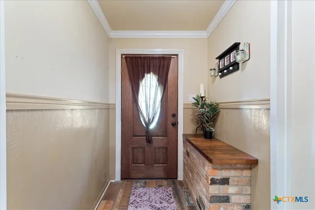 a bathroom with a sink a mirror and a shower