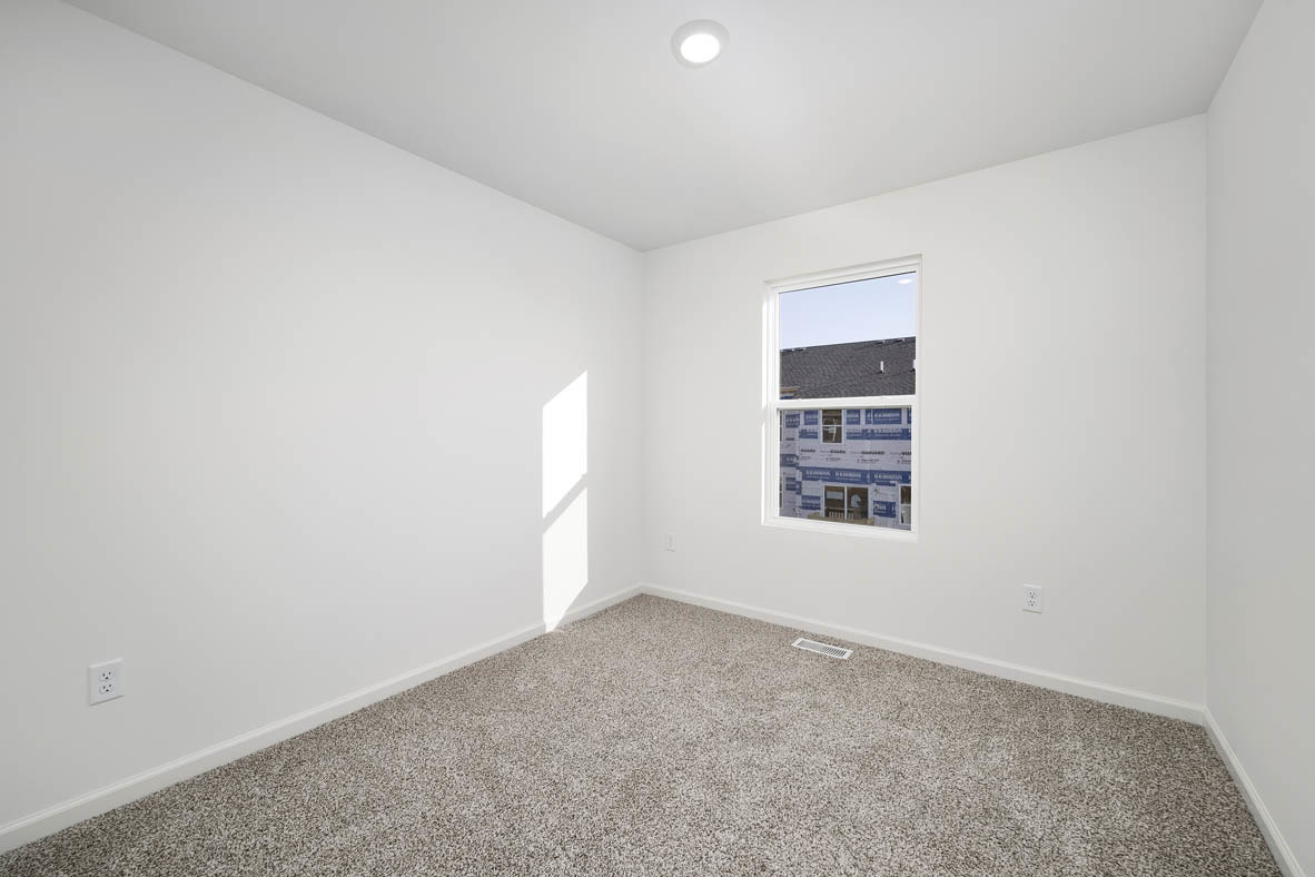 1479 Yosemite Way Pingree Grove, IL 60140 - Photo 11 of 27 an empty room with a window