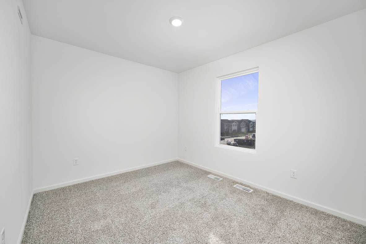 1479 Yosemite Way Pingree Grove, IL 60140 - Photo 12 of 27 an empty room with a window