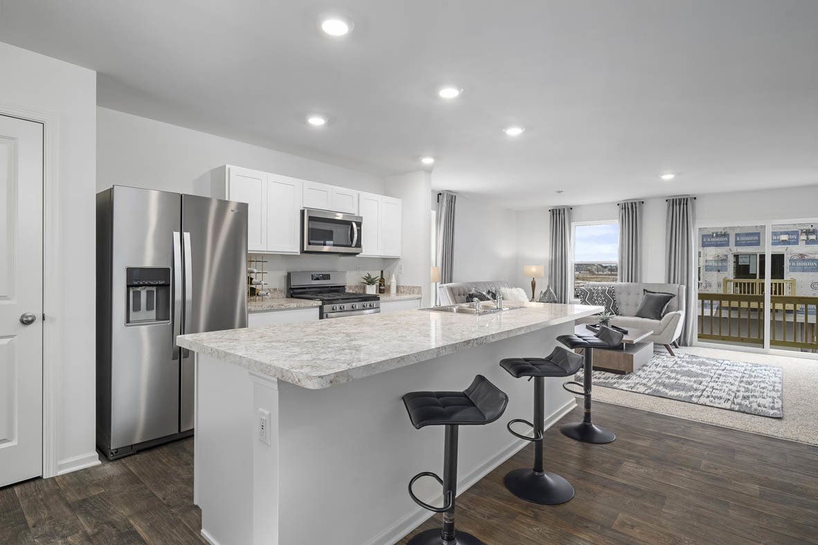 1479 Yosemite Way Pingree Grove, IL 60140 - Photo 16 of 27 a large kitchen with a table and chairs