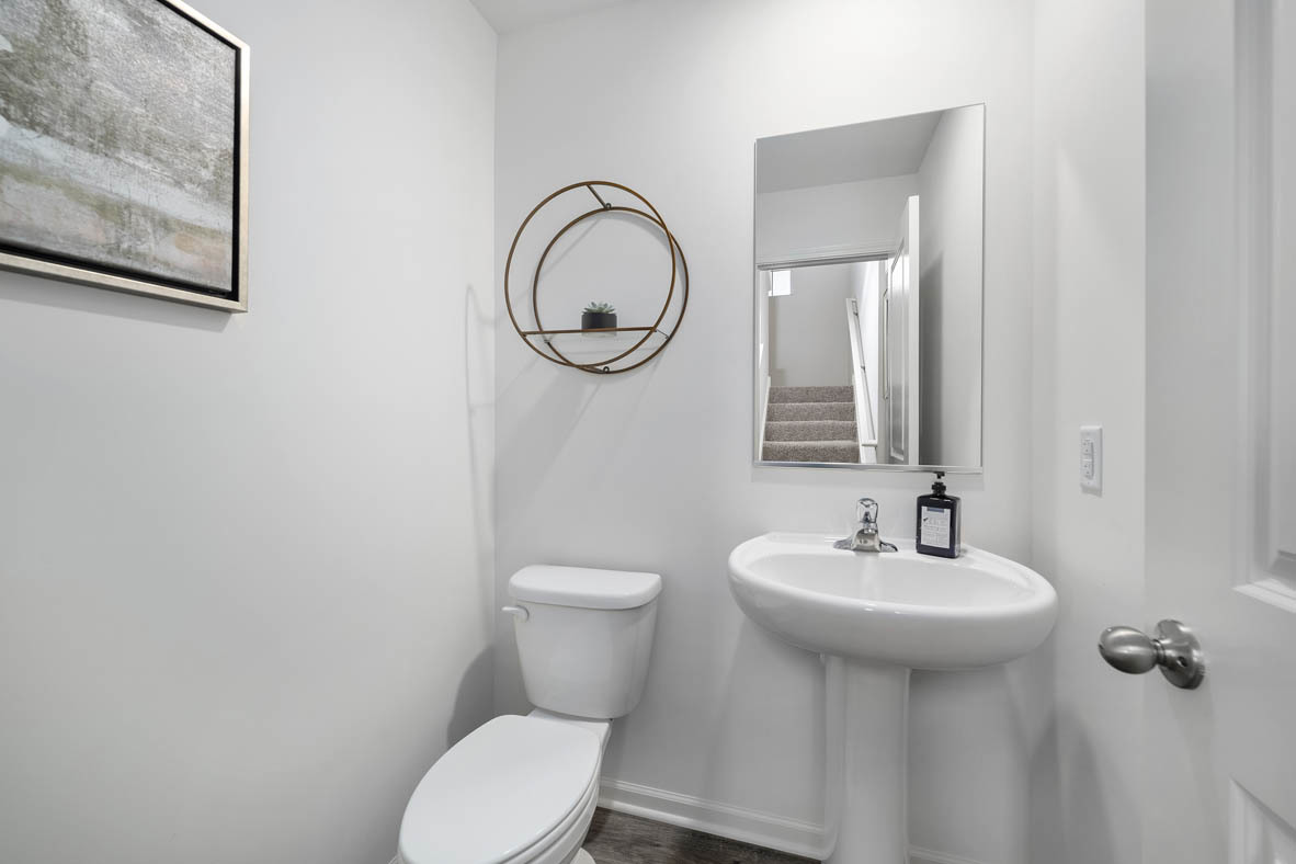 1479 Yosemite Way Pingree Grove, IL 60140 - Photo 21 of 27 a bathroom with a sink and a mirror