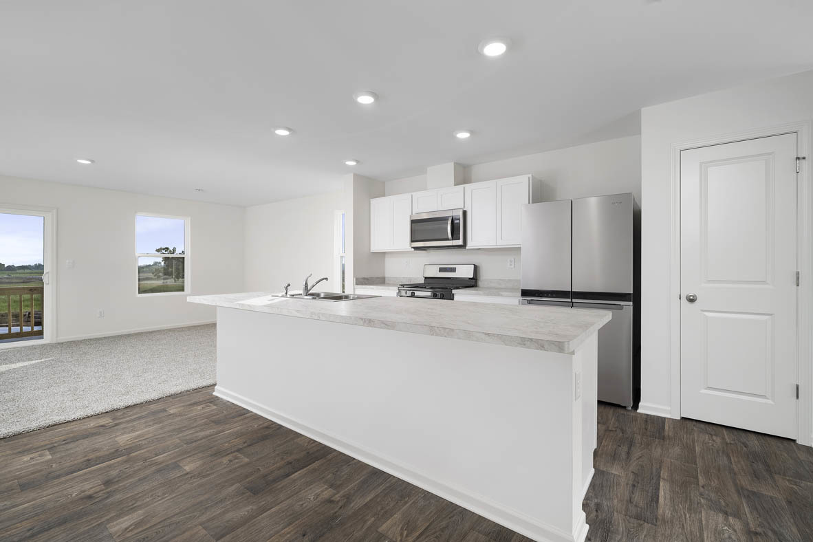 1479 Yosemite Way Pingree Grove, IL 60140 - Photo 3 of 27 a kitchen with stainless steel appliances a refrigerator sink and microwave