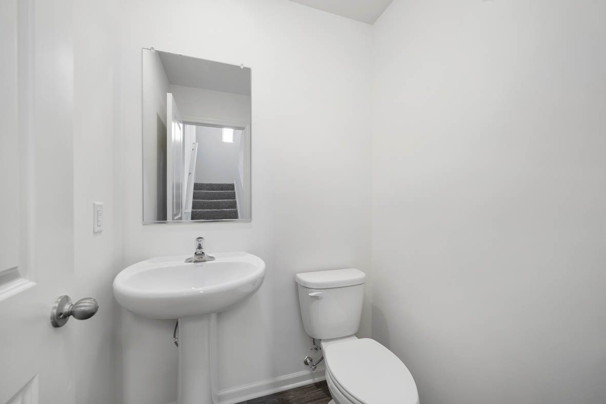 1479 Yosemite Way Pingree Grove, IL 60140 - Photo 5 of 27 a bathroom with a sink toilet and mirror