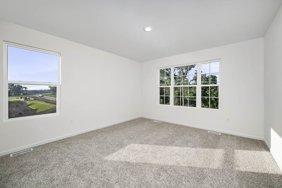 1479 Yosemite Way Pingree Grove, IL 60140 - Photo 9 of 27 an empty room with windows