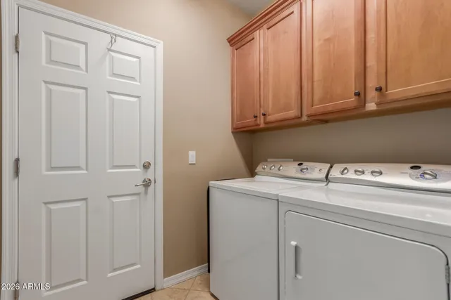 a front view of a house with outdoor seating