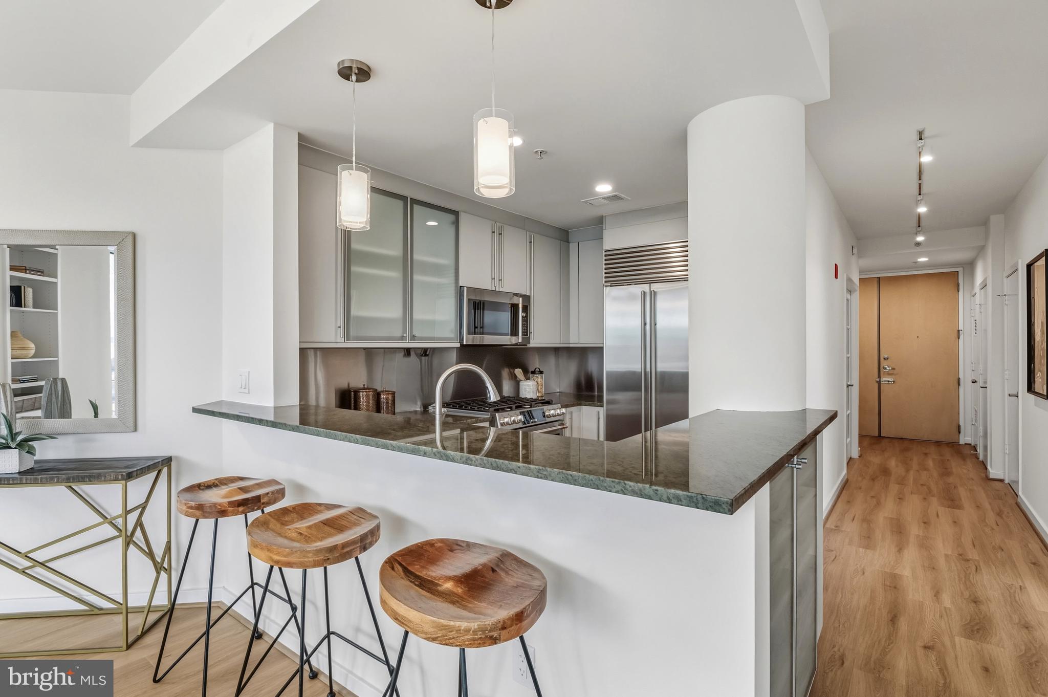 1300 13th Street Northwest, Unit 801 Washington, DC 20005 - Photo 8 of 28 Sub-Zero fridge, Poggenpahl cabinetry...new range