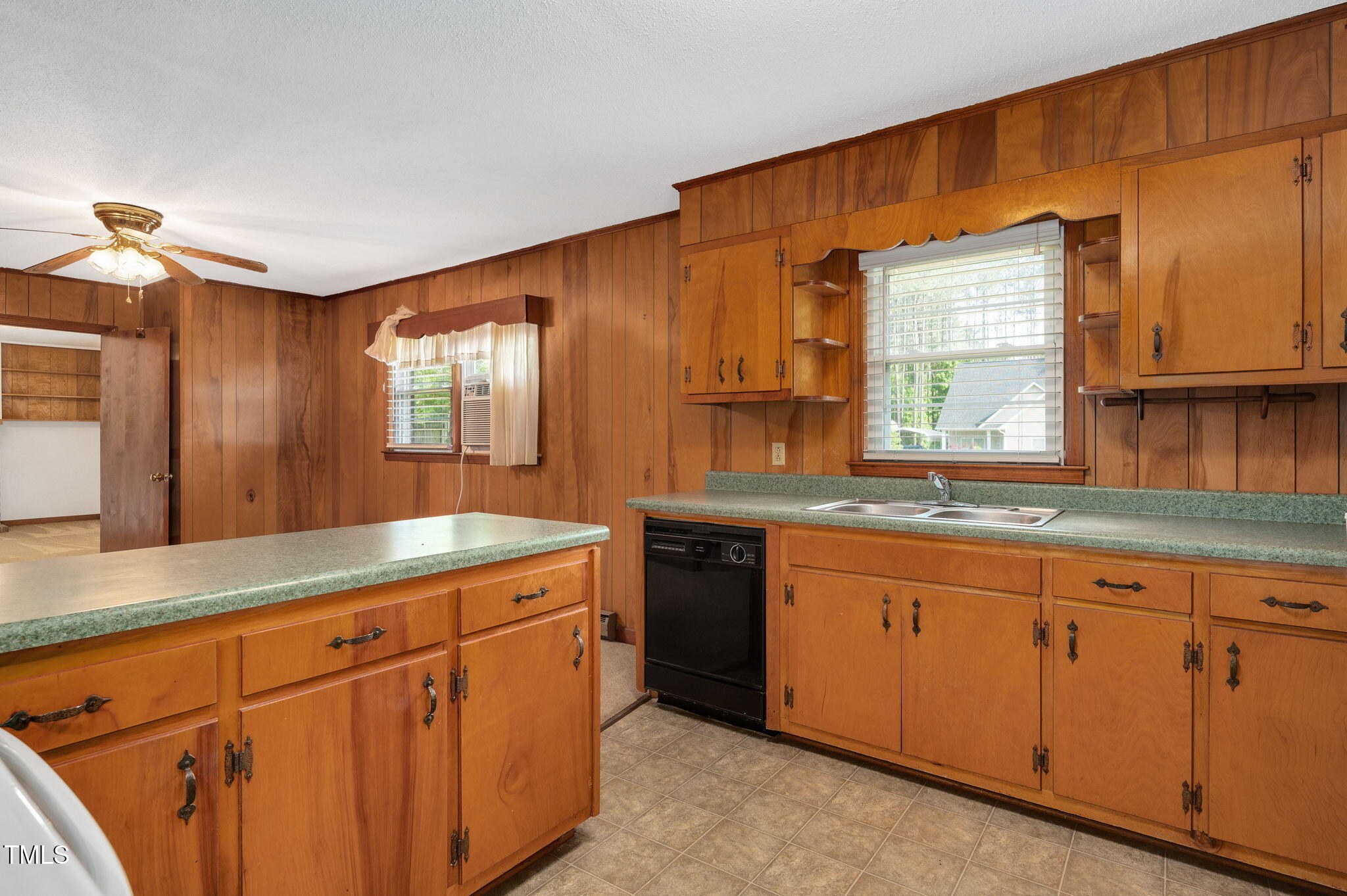 202 Hamilton Road Bunnlevel, NC 28323 - Photo 14 of 31 a kitchen with granite countertop white cabinets and sink