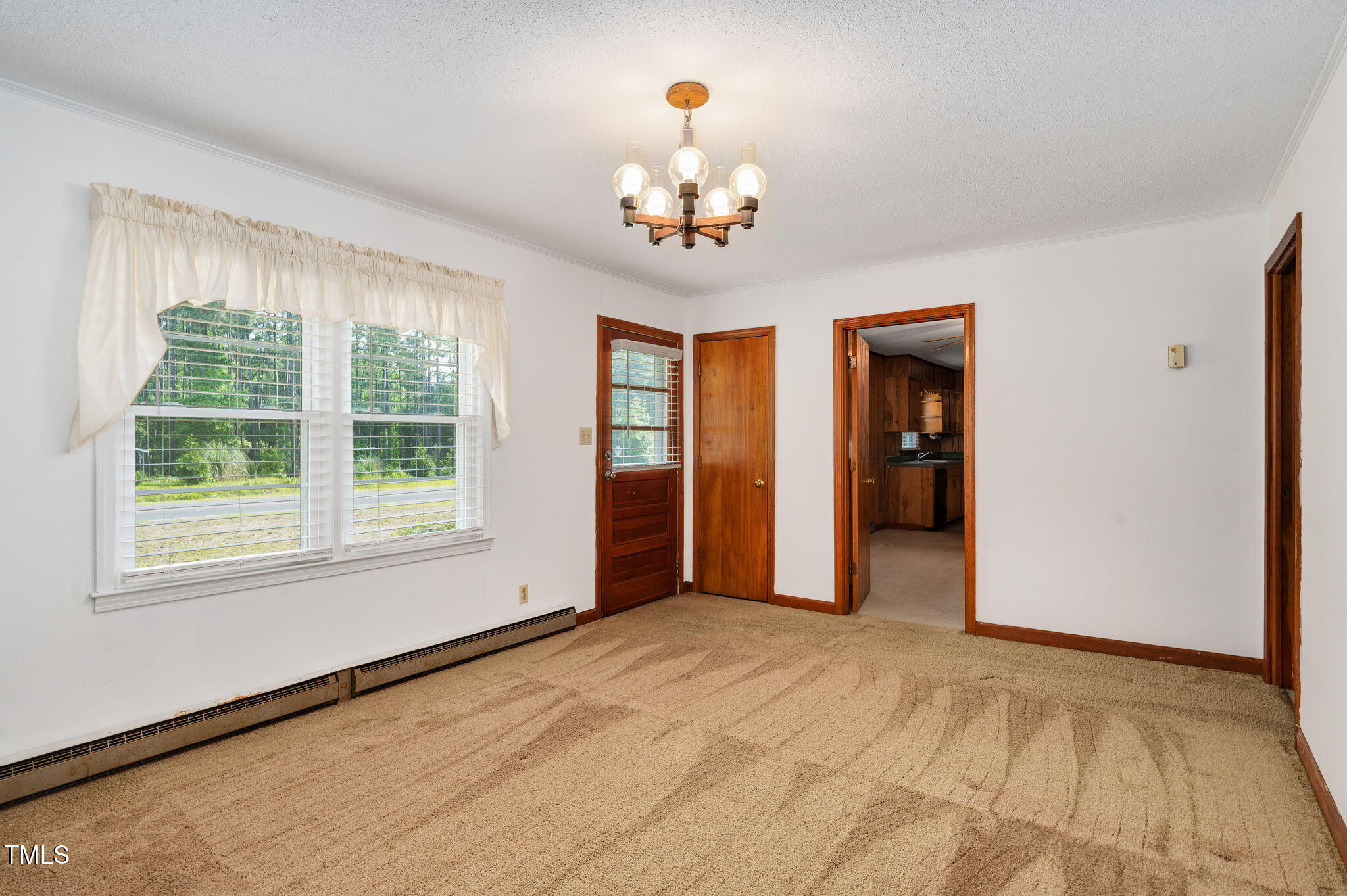 202 Hamilton Road Bunnlevel, NC 28323 - Photo 10 of 31 a view of an empty room with a window