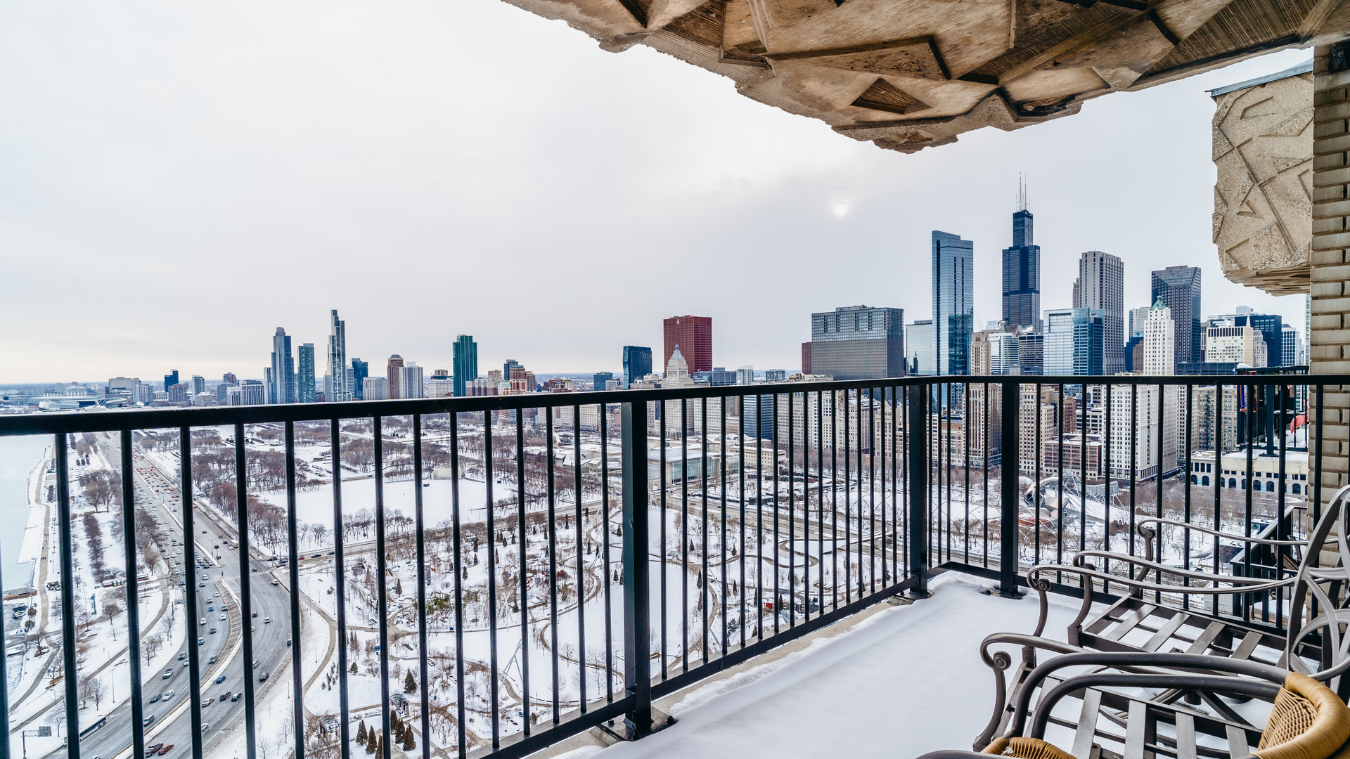 400 East Randolph Street, Unit 3915 Chicago, IL 60601 - Photo 13 of 16 a view of a balcony with furniture