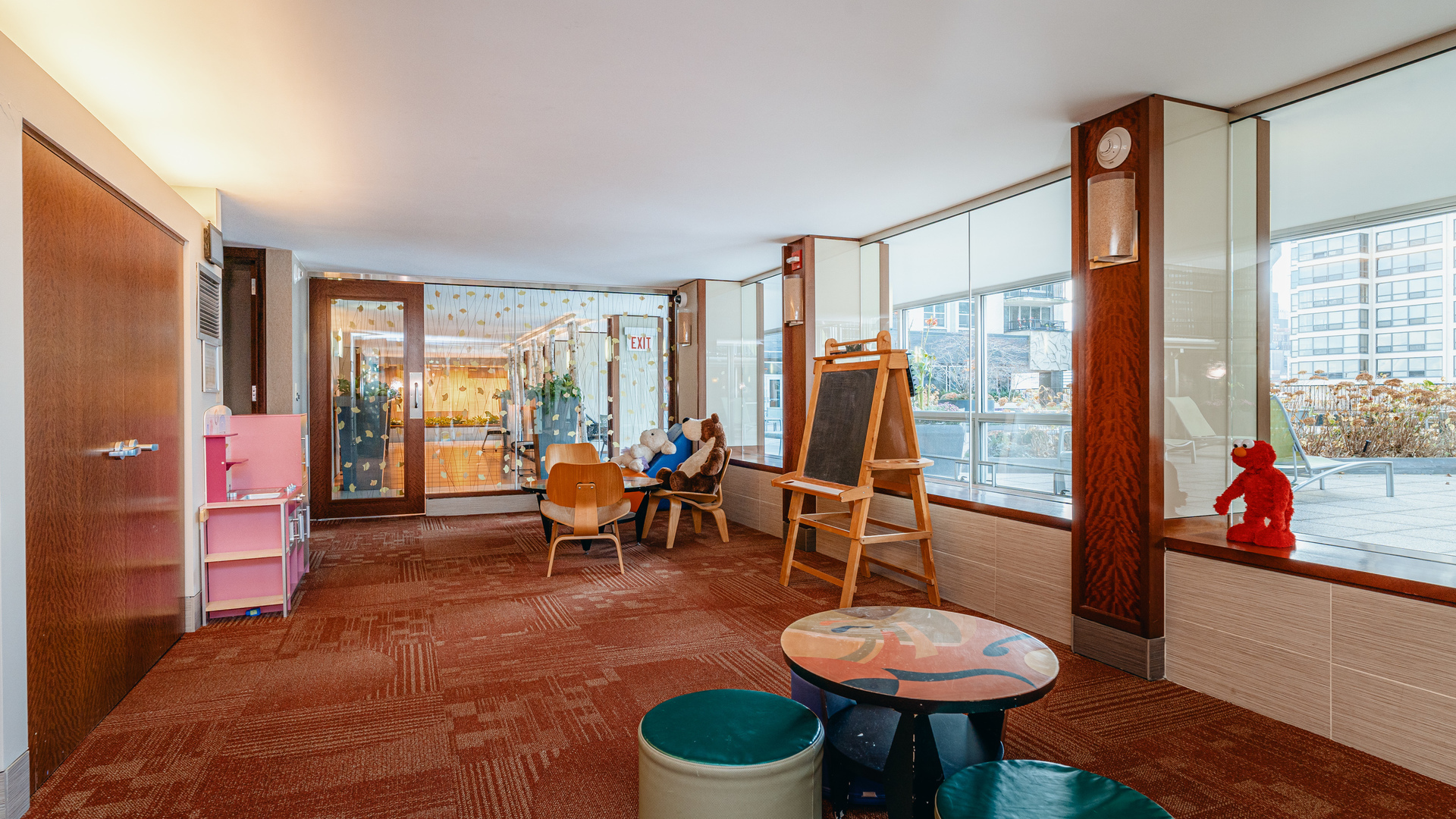 400 East Randolph Street, Unit 3915 Chicago, IL 60601 - Photo 16 of 16 a living room with furniture a lamp and a large window