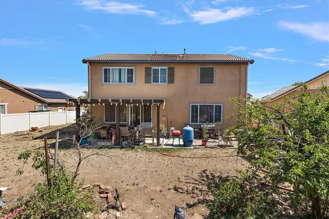 a view of a house with patio
