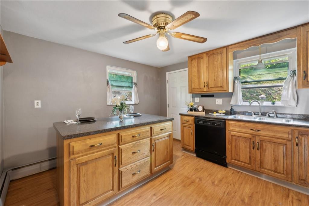 2074 Monroeville Road Monroeville, PA 15146 - Photo 15 of 26 a kitchen with cabinets a sink and appliances