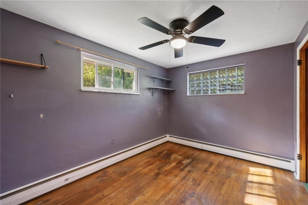 2074 Monroeville Road Monroeville, PA 15146 - Photo 22 of 26 a view of a big room with wooden floor and windows