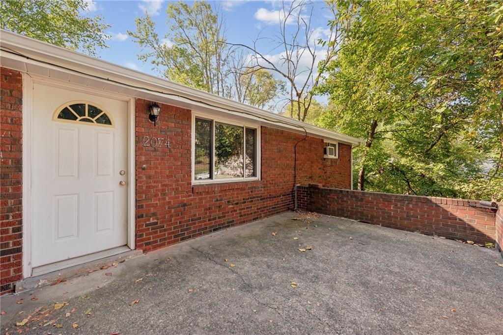2074 Monroeville Road Monroeville, PA 15146 - Photo 4 of 26 a view of a house with a tree