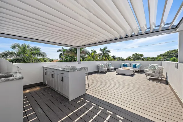 a view of a terrace with seating area