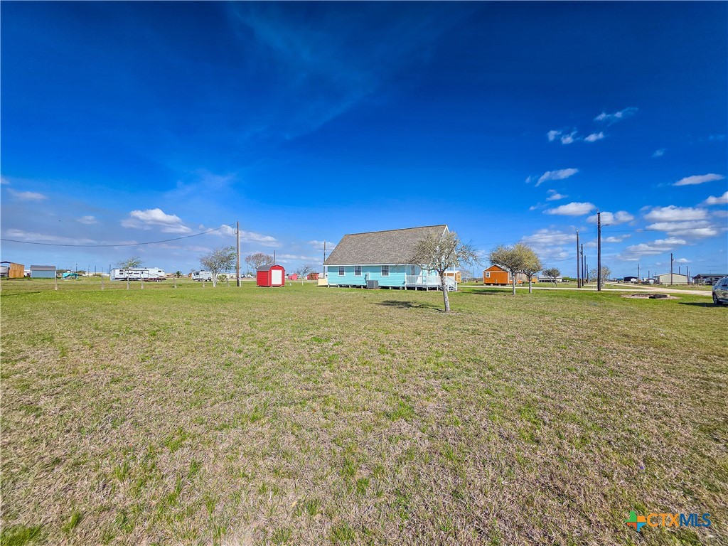 376 Haddock Drive Palacios, TX 77465 - Photo 38 of 41 Spacious property featuring a charming house with a large, open yard. Ideal for those seeking space and tranquility.