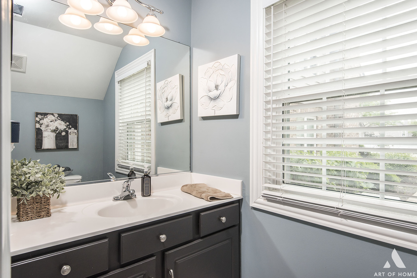 19 Foxcroft Road, Unit 131 Naperville, IL 60565 - Photo 13 of 22 a bathroom with a sink and a mirror