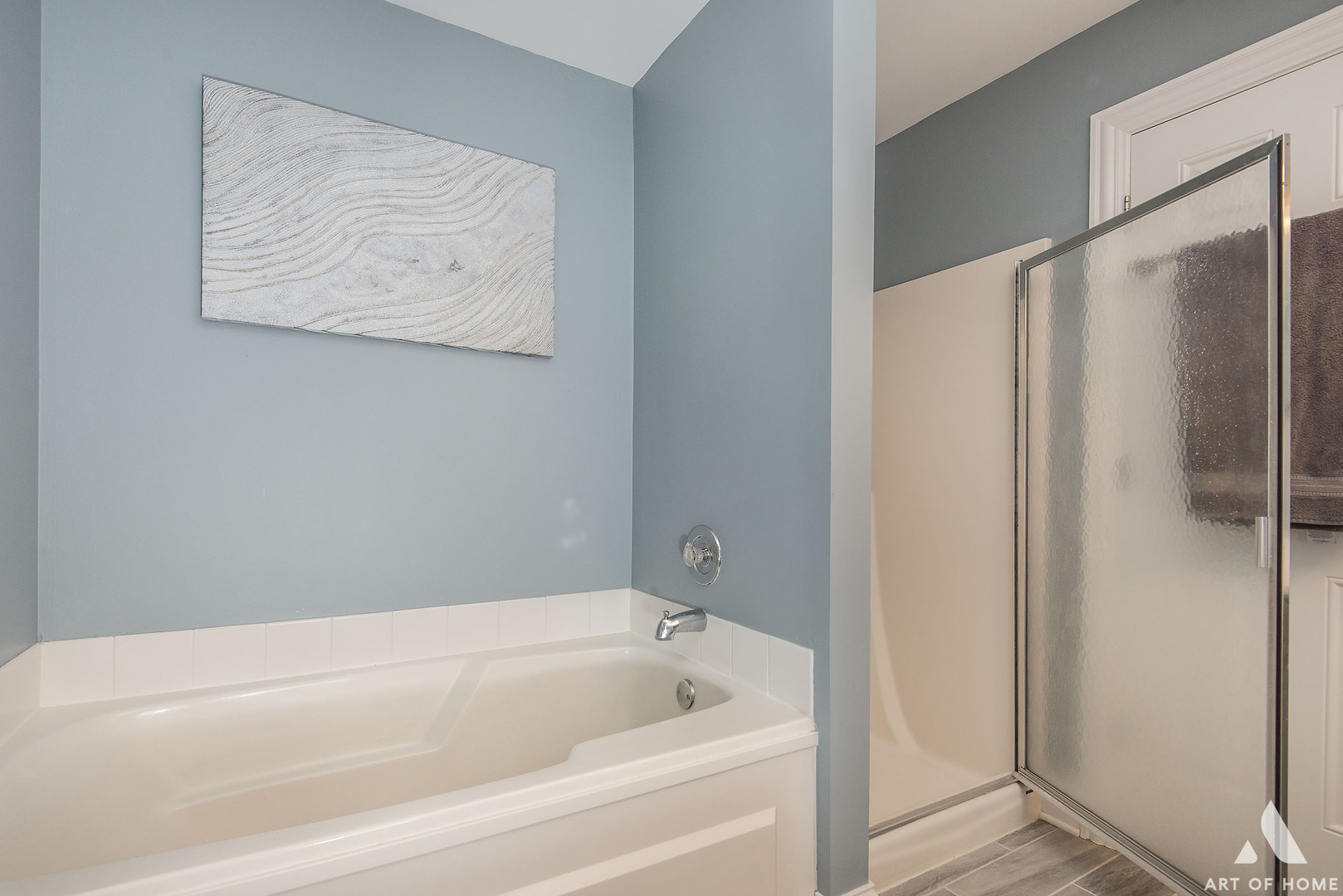 19 Foxcroft Road, Unit 131 Naperville, IL 60565 - Photo 16 of 22 a bathroom with a bathtub and a shower