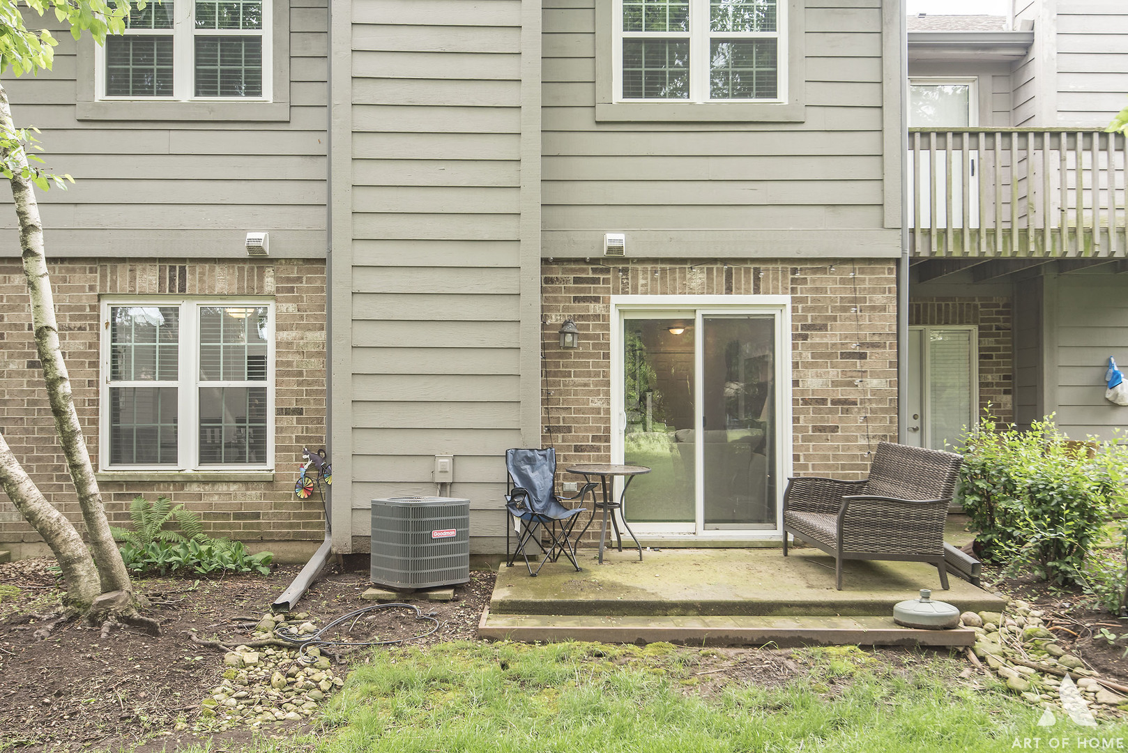 19 Foxcroft Road, Unit 131 Naperville, IL 60565 - Photo 2 of 22 a view of house with backyard and outdoor seating