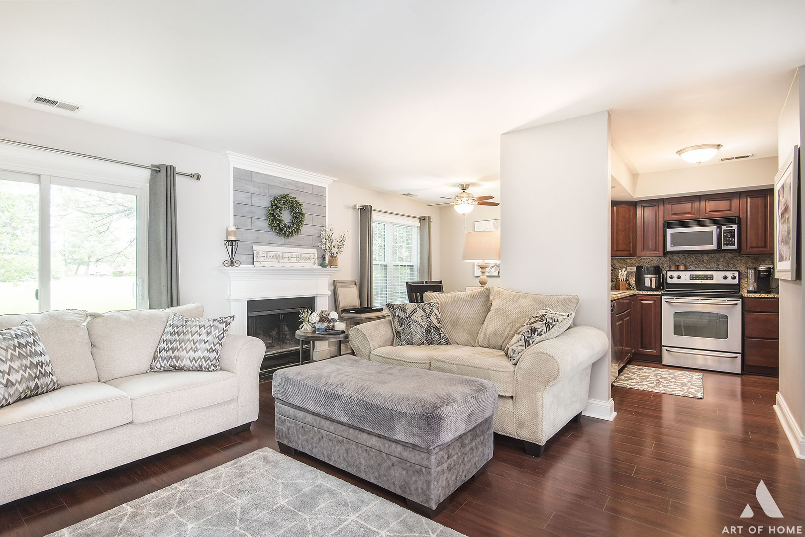 19 Foxcroft Road, Unit 131 Naperville, IL 60565 - Photo 3 of 22 a living room with furniture and a fireplace