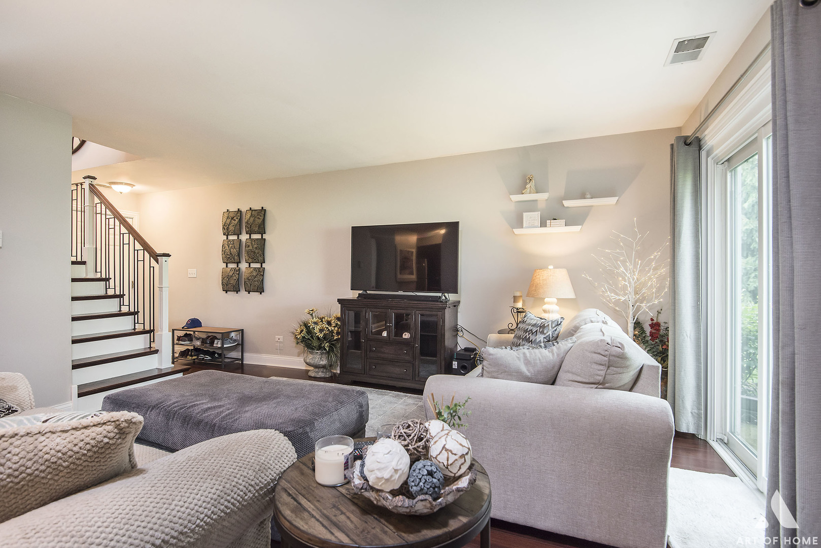 19 Foxcroft Road, Unit 131 Naperville, IL 60565 - Photo 6 of 22 a living room with furniture and a flat screen tv