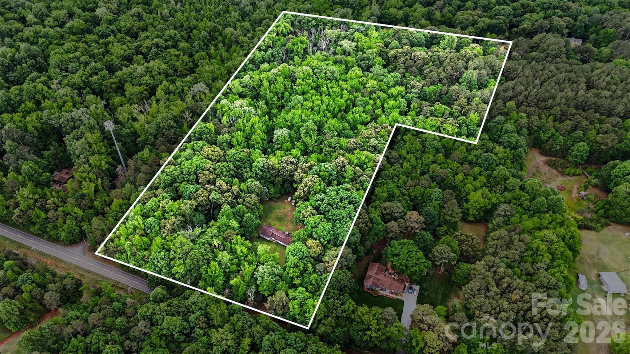 1116 Billy Howey Road Waxhaw, NC 28173 - Photo 15 of 19 a view of a yard with plants