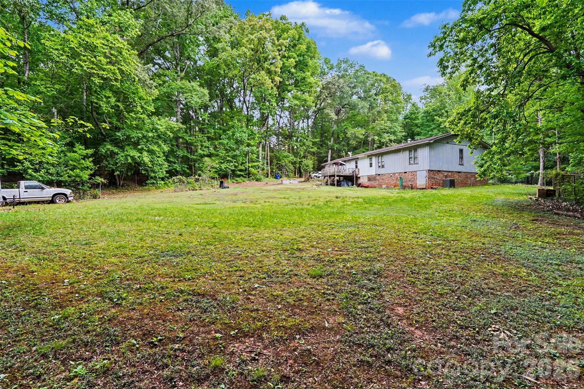 1116 Billy Howey Road Waxhaw, NC 28173 - Photo 2 of 19 a house view with a garden space