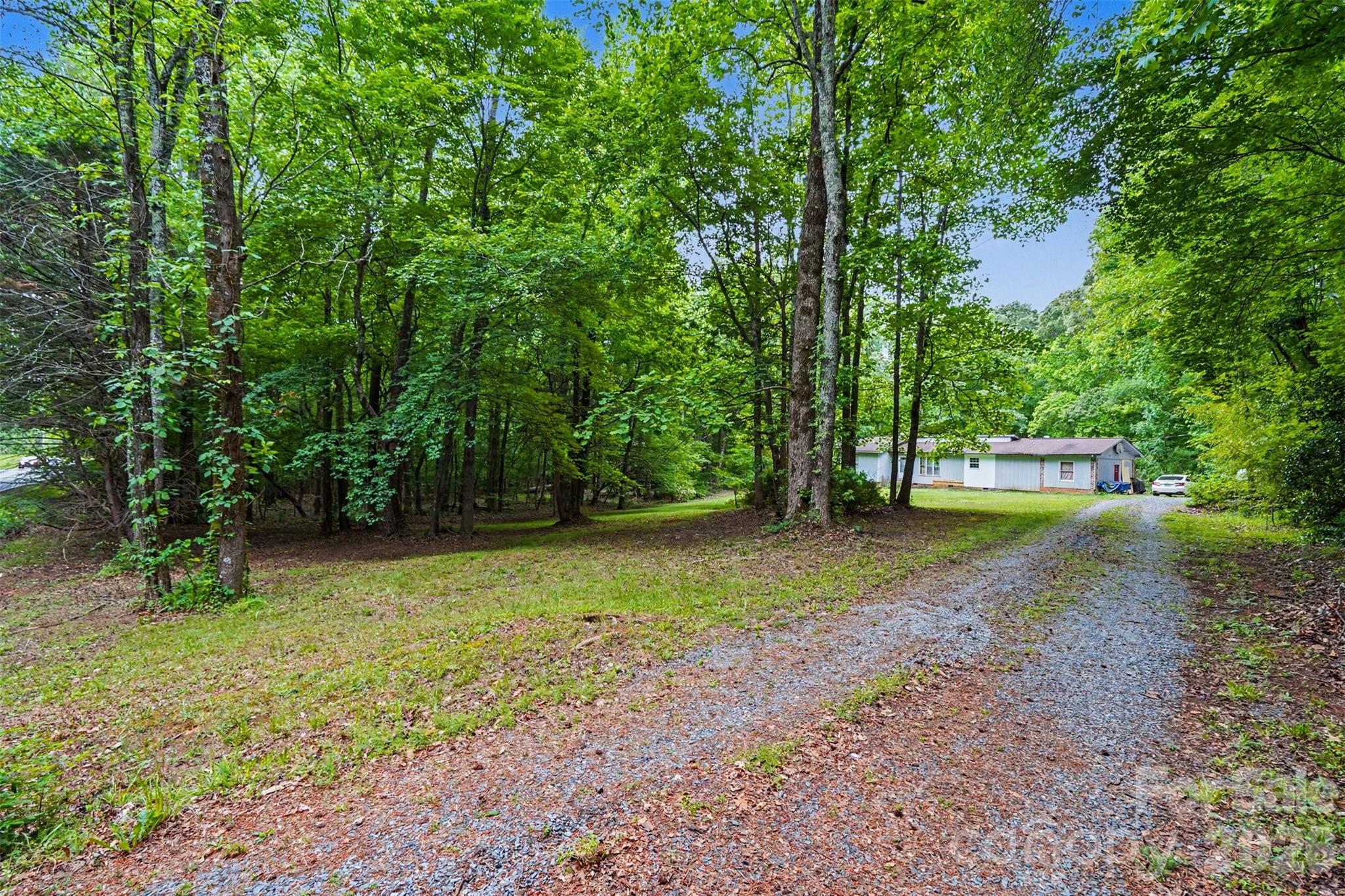 1116 Billy Howey Road Waxhaw, NC 28173 - Photo 3 of 19 a view of outdoor space with deck and trees