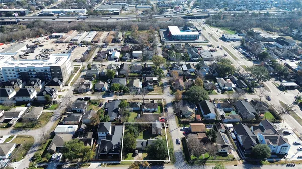 an aerial view of houses and roads