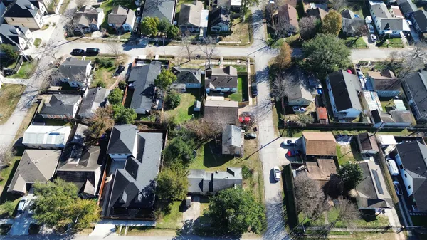 an aerial view of house with yard