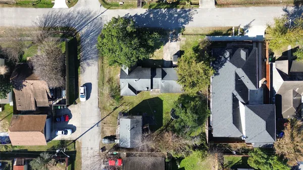 an aerial view of houses with outdoor space
