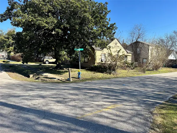 a view of street with houses