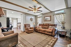 30263 Old Joseph Road Hockley, TX 77447 - Photo 7 of 10 a living room with furniture a ceiling fan and a rug