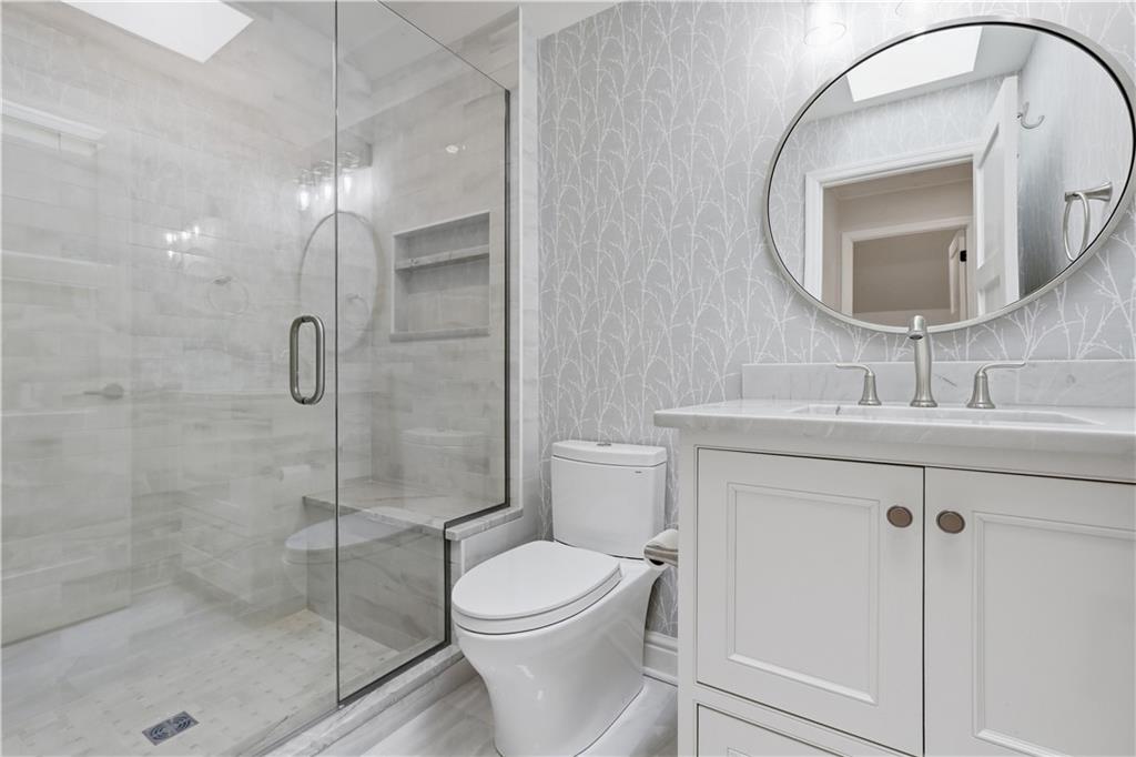 312 Sewickley Ridge Drive Sewickley, PA 15143 - Photo 35 of 50 a bathroom with a sink a toilet and shower