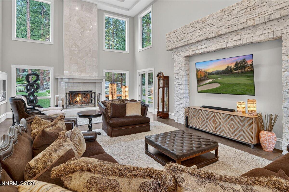 5925 Lake Geneva Court Reno, NV 89511 - Photo 27 of 84 a living room with furniture and a fireplace