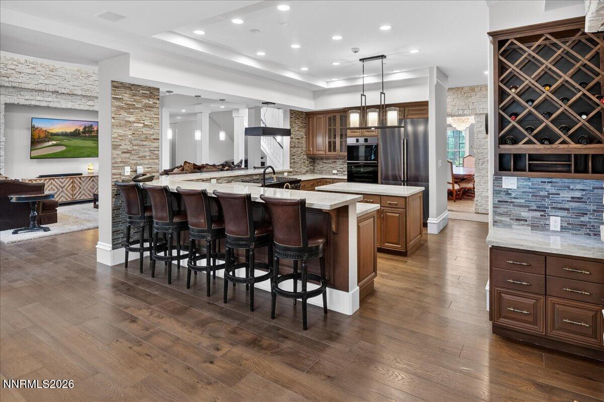5925 Lake Geneva Court Reno, NV 89511 - Photo 31 of 84 a large kitchen with a table and chairs