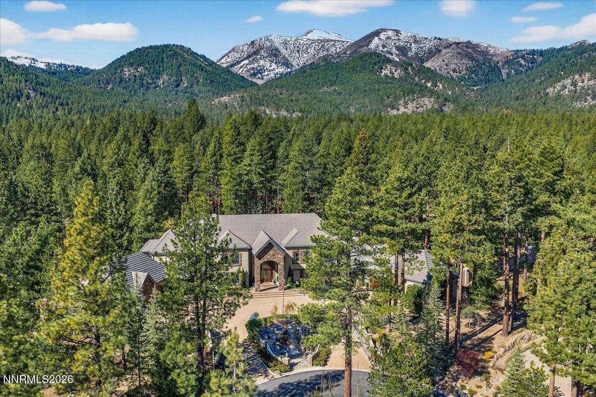 5925 Lake Geneva Court Reno, NV 89511 - Photo 4 of 84 a view of a city with lush green forest