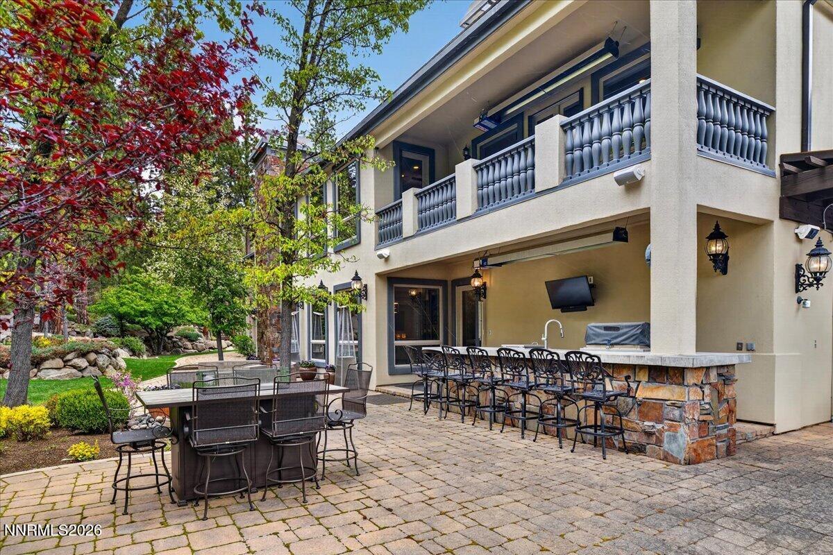 5925 Lake Geneva Court Reno, NV 89511 - Photo 70 of 84 a backyard of a house with outdoor seating