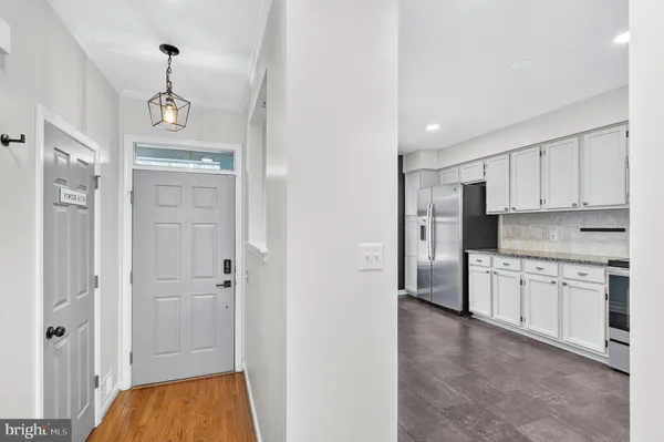 a kitchen with a refrigerator a sink and dishwasher