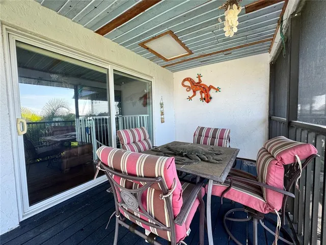 a large kitchen with stainless steel appliances granite countertop a lot of counter space and wooden floors