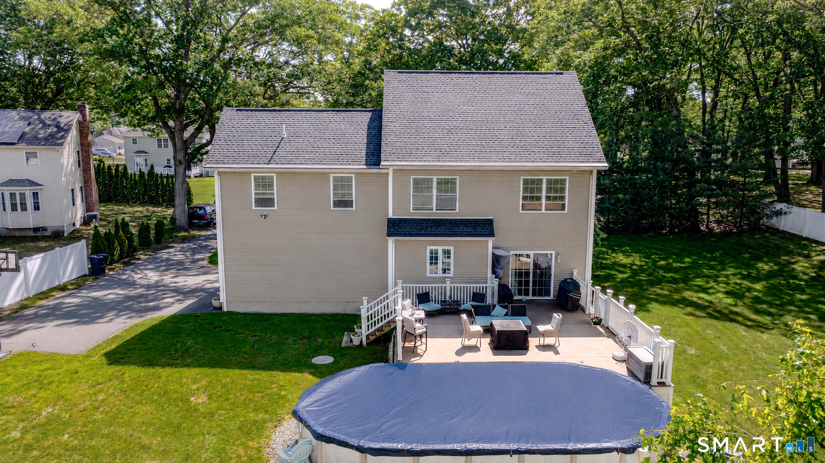 261 Spring Road North Haven, CT 06473 - Photo 4 of 39 a view of house with backyard and outdoor seating