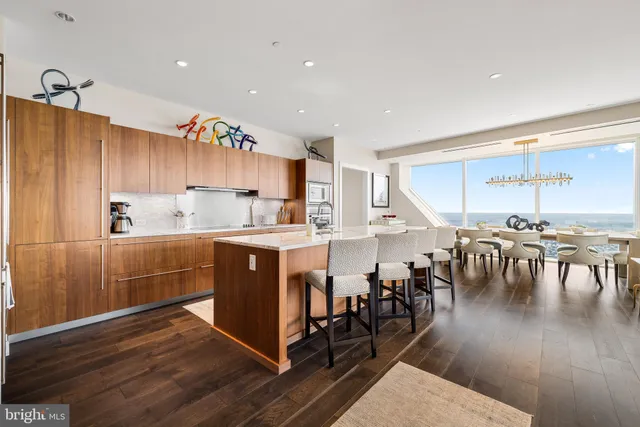 a kitchen with lots of counter space and furniture