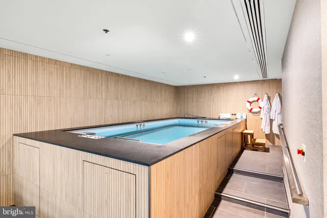a view of a room with kitchen island