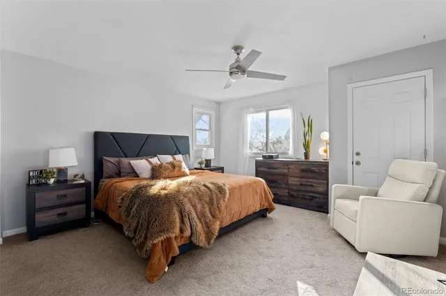 a bed room with a bed and a couch