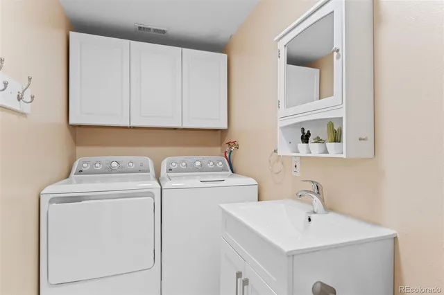 a utility room with dryer and washer