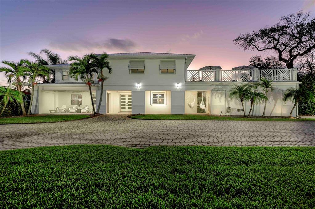 292 South Beach Street Ormond Beach, FL 32174 - Photo 1 of 1 a front view of a house with a yard and garage
