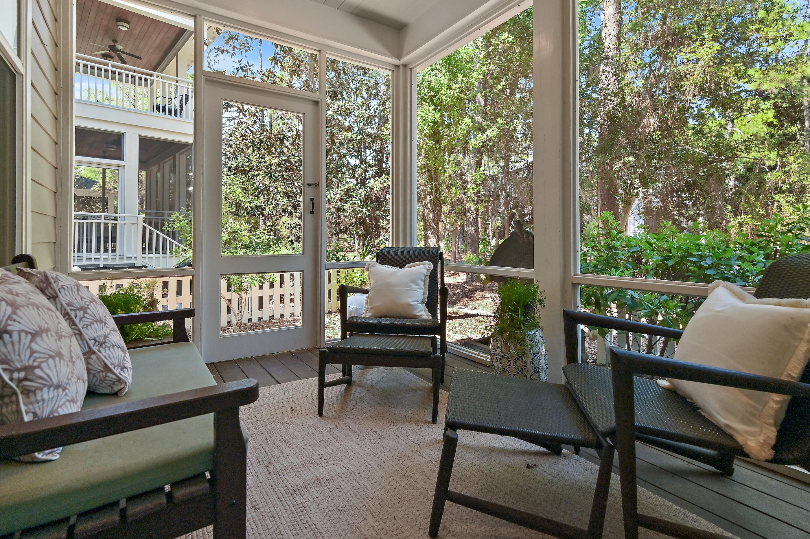 199 Anchor Rode Circle Santa Rosa Beach, FL 32459 - Photo 11 of 43 a living room with furniture and a floor to ceiling window