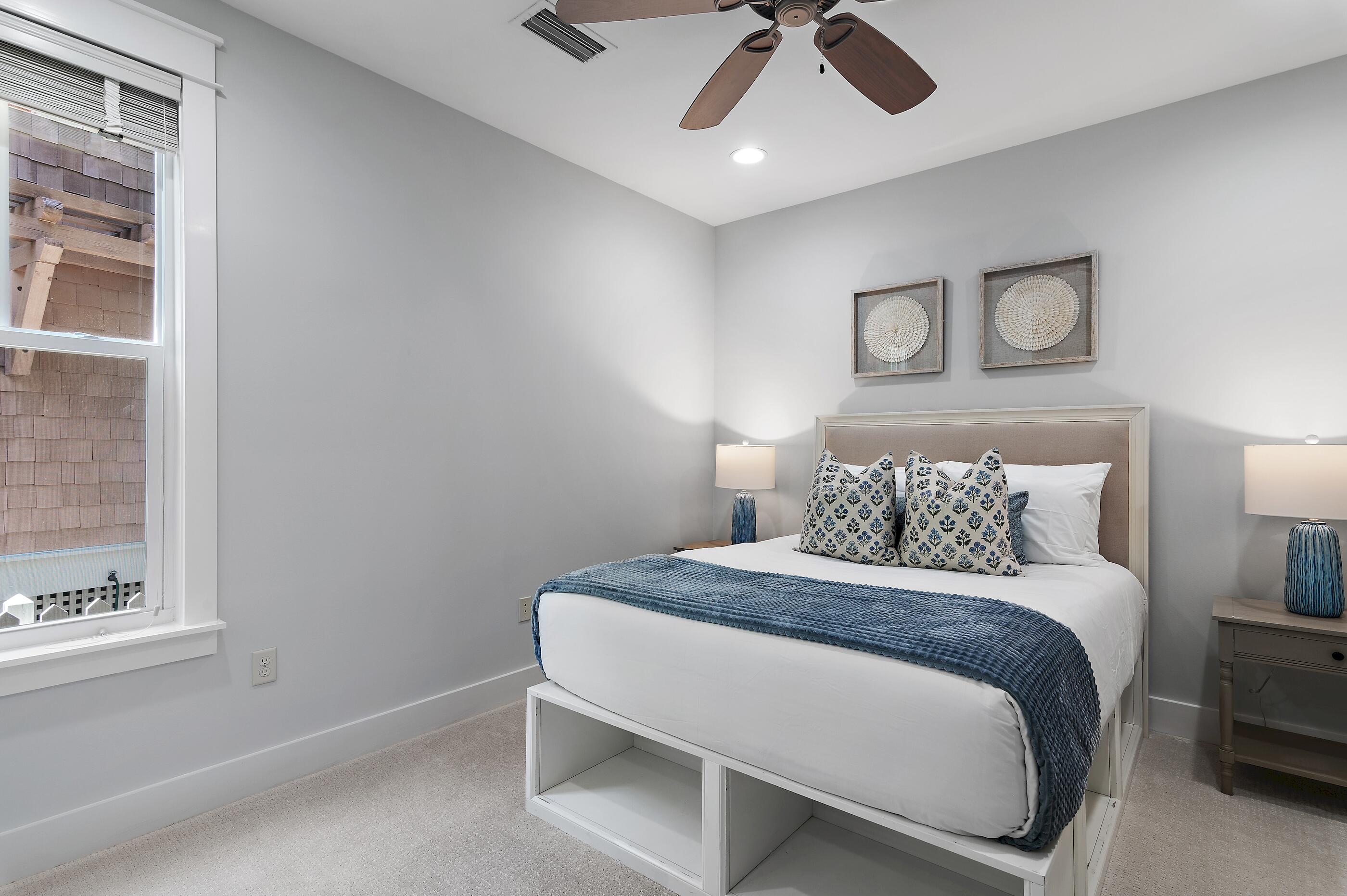 199 Anchor Rode Circle Santa Rosa Beach, FL 32459 - Photo 13 of 43 a bedroom with a bed and a window