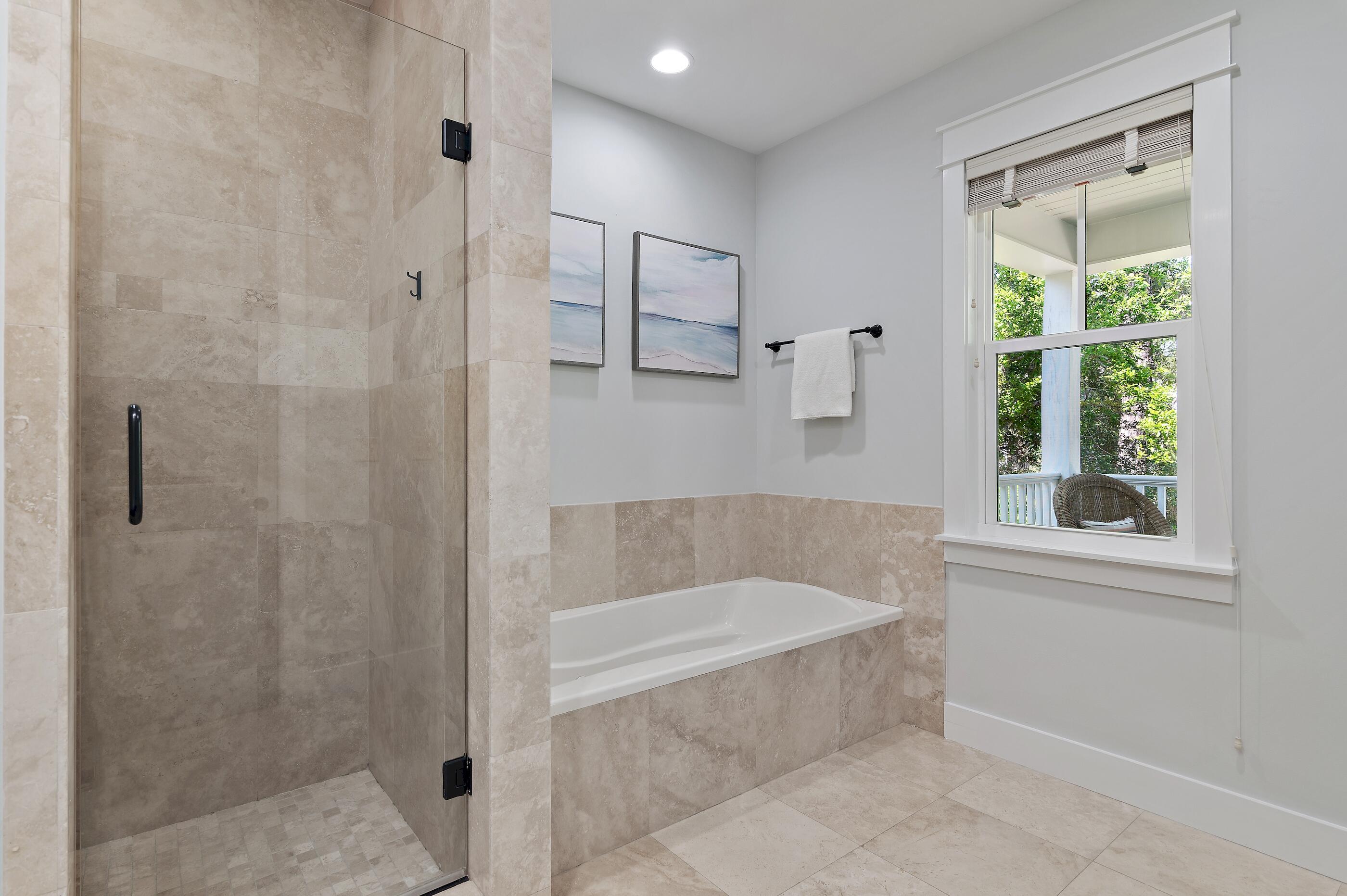 199 Anchor Rode Circle Santa Rosa Beach, FL 32459 - Photo 20 of 43 a bathroom with a bathtub and shower