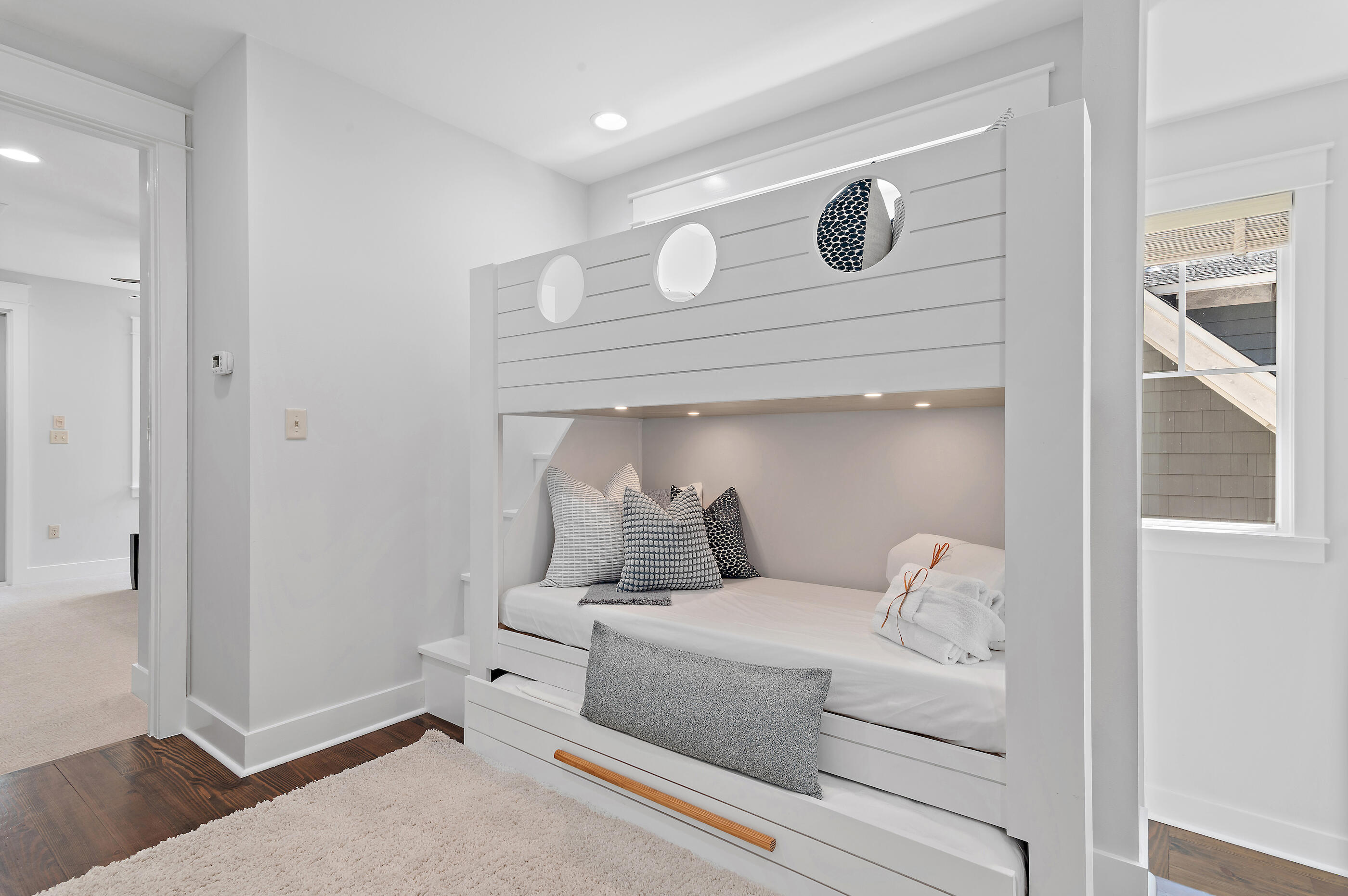 199 Anchor Rode Circle Santa Rosa Beach, FL 32459 - Photo 23 of 43 a bedroom with a bed and cabinets